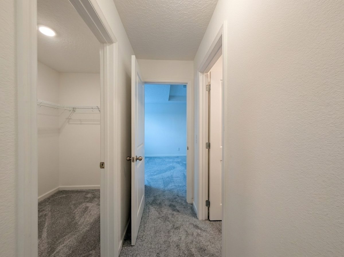Walk-in closet off the bedroom hallway at 2275 Abilia Aly, Apopka