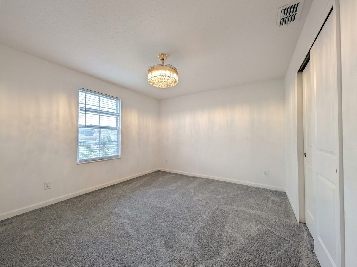 Carpeted bedroom with closet at 2275 Abilia Aly, Apopka